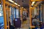 A TriMet Yellow Line MAX train car is mostly empty as it makes its way through downtown Portland, Ore., on Friday, March 20, 2020. TriMet's ridership numbers have decreased significantly as the region deals with the ongoing coronavirus outbreak.