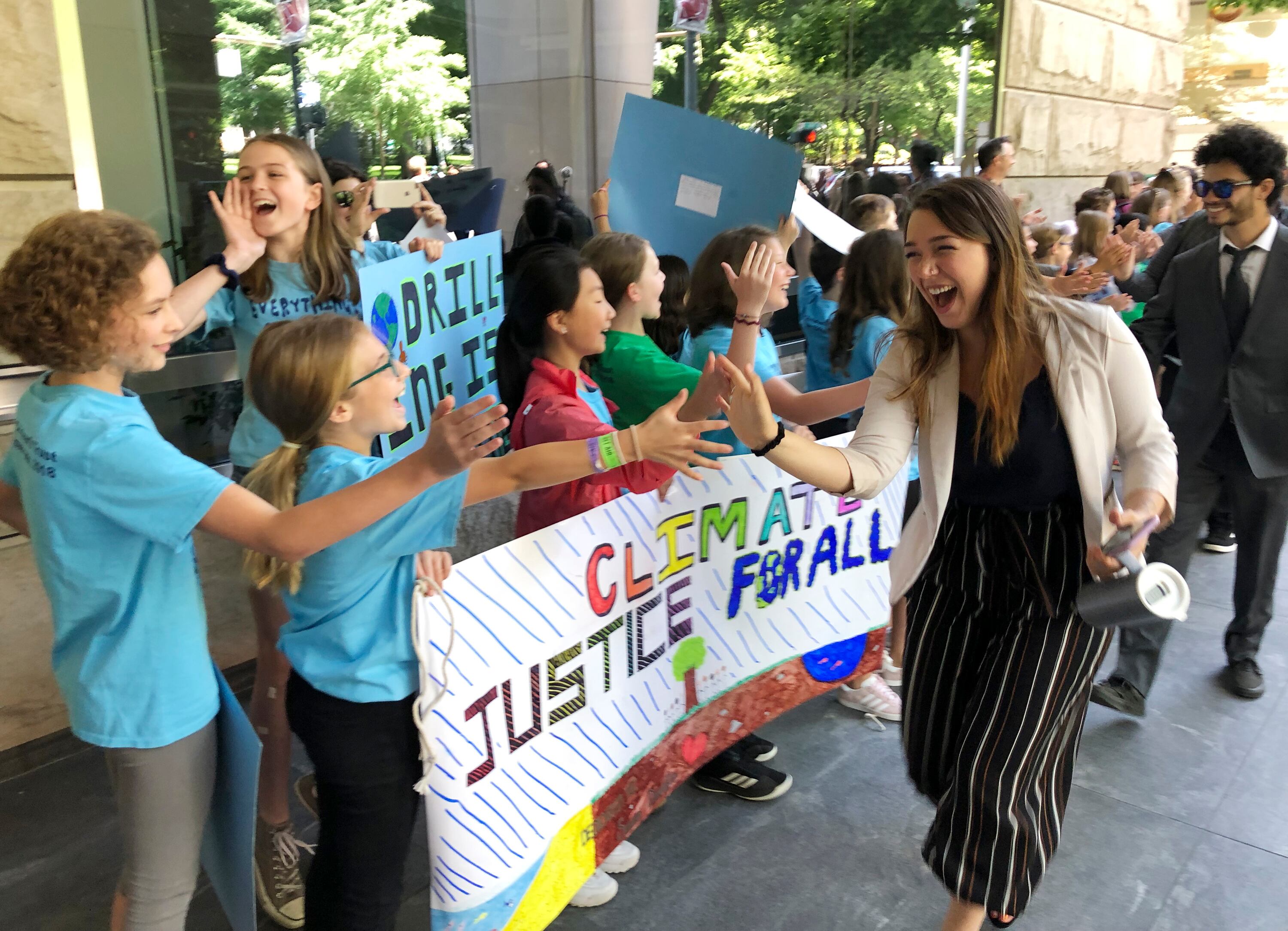 FILE - Kelsey Juliana, of Eugene, Ore., a lead plaintiff who is part of a lawsuit by a group of young people who say U.S. energy policies are causing climate change and hurting their future, greets supporters outside a federal courthouse, June 4, 2019, in Portland, Ore. A 9th U.S. Circuit Court of Appeals panel on Wednesday, May 1, 2024, rejected a long-running lawsuit brought by young Oregon-based climate activists who argued that the U.S. government's role in climate change violated their constitutional rights.