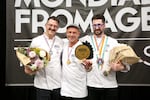 Portlander Sam Rollins (L) of Cowbell Cheese Shop took home second place in this year's Le Mondial du Fromage in Sept., 2023. He's pictured with French cheesemonger Vincent Philippe (C) who took home the top honor and the UK's Nick Bayne (R) who placed third.