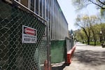 Orange barriers and caution signs surround Neuberger Hall, the latest Portland State University building to undergo major renovations, in 2018.