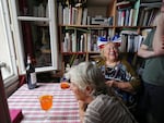 A general view inside an apartment as Parisians wait for Opening Ceremony festivities to reach them for the Paris 2024 Olympic Summer Games.