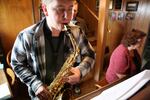 Christian Boyd plays the saxophone, accompanied by music teacher Debby Peckham in Burns, Ore., on April 14, 2019.