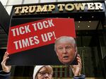 Protesters rally in front of Trump Tower in New York City on Friday.