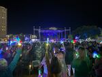 Fans light up their coves at Brandi Carlile's Mothership Weekend music festival in Miramar Beach, Fla.