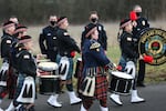 Portland Fire Fighters Pipes and Drums marches at Vancouver officer Donald Sahota's memorial service Feb. 8, 2022. Sahota died Jan. 29 after being mistakenly shot by a Clark County Sheriff's Deputy.