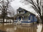 Many houses in Waitsburg, Washington, a small wheat town, are still sitting in lakes of trapped water. Residents were busy moving out their valuables, and accessing damage on Saturday, Feb. 8, 2020.