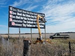 Louisiana has become the first state to require that the Ten Commandments be displayed in every public school classroom under a bill signed into law by Republican Gov. Jeff Landry on Wednesday. Above, workers repaint a Ten Commandments billboard off of Interstate 71 near Chenoweth, Ohio, on Nov. 7, 2023. 