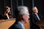The gubernatorial candidates Republican state Sen. Christine Drazan, left, and Democratic Gov. Tina Kotek, laugh as journalist Nigel Jaquiss of the Oregon Journalism Project jokes about the rarity of seeing them in the same room, during the gubernatorial debate in Eugene, Ore., at the University of Oregon on Oct. 1, 2026.