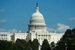 The U.S. Capitol is seen from Pennsylvania Avenue, on Aug. 30. The House was set to vote Tuesday on a bill to extend government funding past this fall's midterm elections.