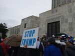 Before the Electoral College vote, protesters gathered on the front steps of the Oregon Capitol.
