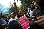 Student activist Neha Bora, center, shouts slogans during a youth demonstration demanding the resignation of the country's election chief Gyanesh Kumar, in New Delhi, India, Friday, Oct. 16, 2026.