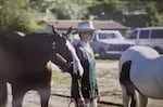 Melissa Sargent shows Williams’ horses Valentine and Duchess in 2001.