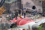 Members of the Indian Army's engineering team prepare to remove the wreckage of an Air India Boeing 787 Dreamliner aircraft, bound for London's Gatwick Airport, which crashed during take-off from an airport in Ahmedabad, India June 14, 2025.