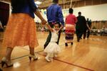 Congregants kick off the evening celebration with a traditional Tongan march around the auditorium at The Church of Jesus Christ of Latter-day Saints Rose City Ward in Portland 