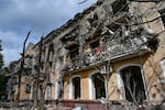 A three-story residential building destroyed in an overnight rocket attack by Russian forces in Zaporizhzhia, Ukraine, on Saturday.