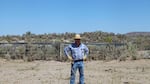 Harney County rancher Scott Franklin has about 40 cattle and calves on this plot of land. In the distance is the headquarters of the Malheur National Wildlife Refuge. Franklin's family has ranched in Harney County for generations.