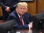 Former President Donald Trump attends a pre-trial hearing Thursday for charges he faces in a New York hush money case. Two civil judgments in New York put Trump on the hook for hundreds of millions of dollars.