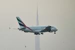 The U.S. and other nations have agreed to tap into oil reserves, but the move might not do much to bring jet fuel prices down rapidly, an expert tells NPR. It's one way violence in the Middle East can affect flights around the world. Here, an Emirates airliner prepares to land at Dubai's main airport on Sunday.