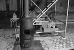 A close up of the stove in which the cardinals will burn their ballots during the election for a new pontiff in the Sistine chapel in Vatican City shown October 1978. At right a container with chemicals to produce white and black smoke in the time of burning to say if a new pope was named or not. (AP Photo)