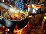Rohingya in the refugee camp cook meat for Jalsa, a traditional gathering to raise donations for the mosque at the start of each winter.