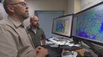 Chief scientist Ian Madin and arborist Brian French review LiDar data at DOGAMI.