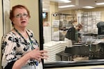 Clackamas County Elections Clerk Sherry Hall speaks at the office in May, as staffers reprocess hundreds of thousands of ballots that were damaged by a misprint.  (AP Photo/Gillian Flaccus, File)