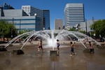 Children play in the fountain at the Portland waterfront last summer. A new report says the number of children in Oregon experiencing anxiety and depression increased by 40% from 2016 to 2020.