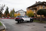 Portland police officers investigate a shooting on Oct. 26, 2021 in North Portland. 