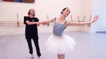OBT Artistic Director Dani Rowe coaches Carly Wheaton during a rehearsal for Swan Lake on September 14, 2023.