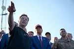 Elon Musk speaks with then-President-elect Donald Trump and guests at a viewing of the launch of the sixth test flight of the SpaceX Starship rocket on November 19, 2024, in Brownsville, Texas.