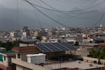 Solar panels are seen on the rooftops of houses on June 24, 2025 in Islamabad, Pakistan.