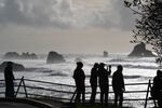 FILE - Crowds gather to watch the king tides at Indian Beach in Ecola State Park, Ore., on Friday, Nov. 7, 2025.