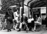 Paul Bragdon, center, sits on the Reed College campus.