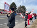 Supporters of a union for medical technical workers picket the St. Charles Bend hospital on March 4, 2021.