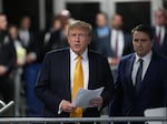 Former U.S. President Donald Trump with attorney Todd Blanche speaks to the media during his trial for allegedly covering up hush money payments, at Manhattan Criminal Court on Tuesday in New York City.