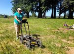 Researcher and Northern Cheyenne tribal member Marsha Small uses ground-penetrating radar in the cemetery at Chemawa Indian School in summer 2021.