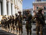 Soldiers block the street in front of the presidential palace (right) and the Legislative Assembly (left) in Plaza Murillo in La Paz, Bolivia, on Wednesday.