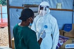 Health workers interact at the Evangelical Medical Center, in Bunia, eastern Congo, Friday, July 3, 2026, where Ebola clinical trials are scheduled to take place.