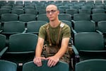 Private 1st Class Jake Mckay poses for a photo inside the auditorium he has history class with other recruits in Fox Company 2nd Recruit Training Battalion at Marine Corps Recruit Depot.