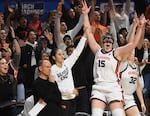 Oregon State forward Raegan Beers (15) celebrates a 3-point basket from the bench next to head coach Scott Rueck, left, during the second half of a second-round college basketball game in the women's NCAA Tournament against Nebraska in Corvallis, Ore., Sunday, March 24, 2024. Oregon State won 61-51.