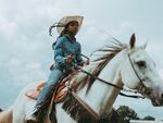 Ivan McClellan has spent the last 5 years taking pictures of Black cowboys, like Kortnee Solomon, pictured here, in Hempstead Texas in 2020.