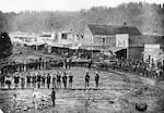 A civic celebration in Portland, circa 1858-1859. At a referendum in 1857, voters approved Oregon’s first constitution and petitioned for statehood. Oregon was admitted to the Union one year and three months later.