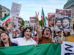 Protesters attend a rally against a death sentence given to Toomaj Salehi, a popular rapper in Iran, and to support to the women of Iran, in Berlin, Germany, on Sunday, April 28, 2024.  Iran's Supreme Court overturned Salehi's death sentence on Saturday, June 22, 2024, his lawyer Amir Raisian said.