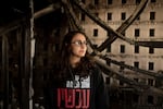 Sharon Alony Cunio cries as she poses for a portrait in the ruins of her home in Kibbutz Nir Oz on January 15. She and her family were kidnapped by Hamas militants on Oct. 7, 2023. Cunio and her 3-year-old twin daughters were released in November, but her husband, David, remains captive in Gaza. She recalls that meals during captivity would include canned food and a sometimes moldy piece of pita.