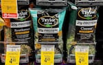 Falling grocery prices helped to keep inflation in check last month. Lettuce prices dropped sharply in July after an outbreak of food-borne illness prompted a recall of some leafy greens.