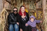 Calli, center, poses with her husband and daughter on a recent family outing to Siemers Farm in Mead, Wash.