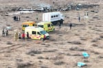 The wreckage of Azerbaijan Airlines Embraer 190 lays on the ground near the airport of Aktau, Kazakhstan, on Wednesday.