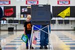 "When he grows up, he can also help to keep this country free," said David Niemitz after voting with his son, William, 7, at Manchester High School November 08, 2022. Full story here.