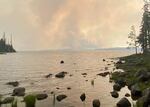 Smoke from the Cedar Creek Fire can be seen from the opposite short of Waldo Lake in this photo taken Aug. 21, 2022.