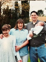 Marc Fogle, right, pictured with family in an undated photo. Fogle was stabbed to death by an on-duty Clark County Sheriff's Office deputy following an altercation in 2025.